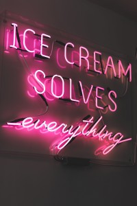 neon sign saying ice cream solves everything to show ice cream shops near woodland hills